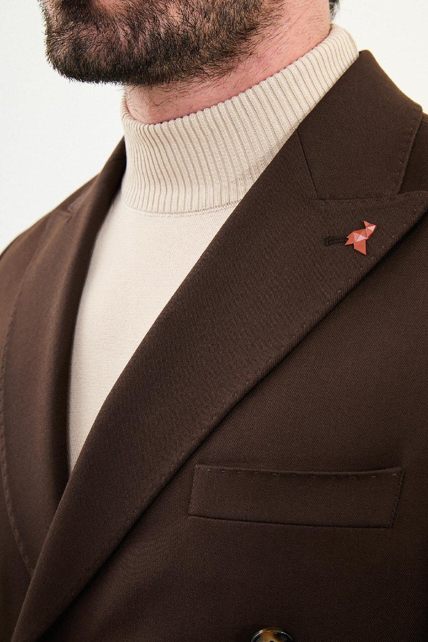 Men wearing chocolate brown slim-fit double-breasted wool-blend suit with peak lapels and cream turtleneck, winter formal outfit.