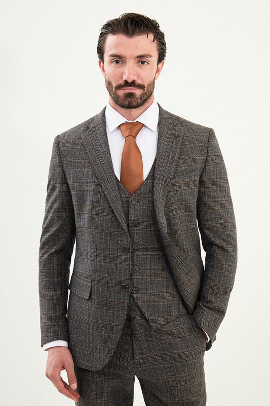 Men’s brown glen plaid slim-fit three-piece wool-blend suit with single-breasted two-button jacket, notch lapels, patch pockets, five-button waistcoat, tapered trousers, barchetta chest pocket, and black origami lapel pin.