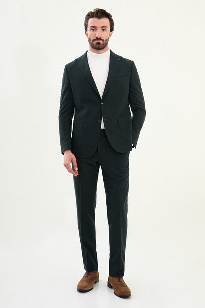 Men’s dark green slim-fit mono-collar (mandarin collar) suit with single-breasted jacket, matte micro-texture fabric, and clean minimalist tailoring designed for turtleneck layering.