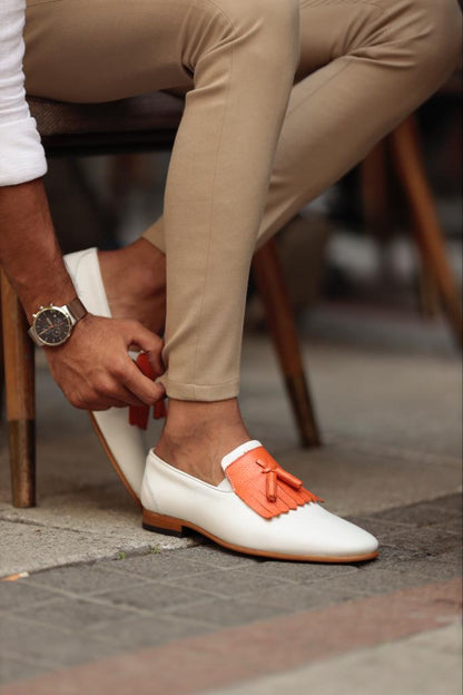 Empire White Kilt Tassel Slip-Ons: Elegance Redefined