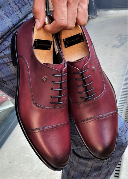 Stefano Burgundy Wholecut Oxfords: The Epitome of Sophisticated Footwear